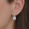Sunburst Emerald Cut Diamond Drop Earrings with Halo in 18K White Gold