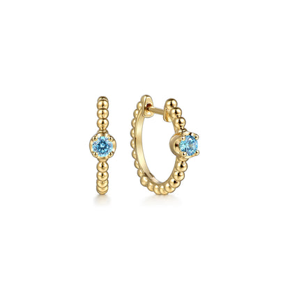 14K Yellow Gold Bujukan Blue Topaz 15mm Huggie Earrings