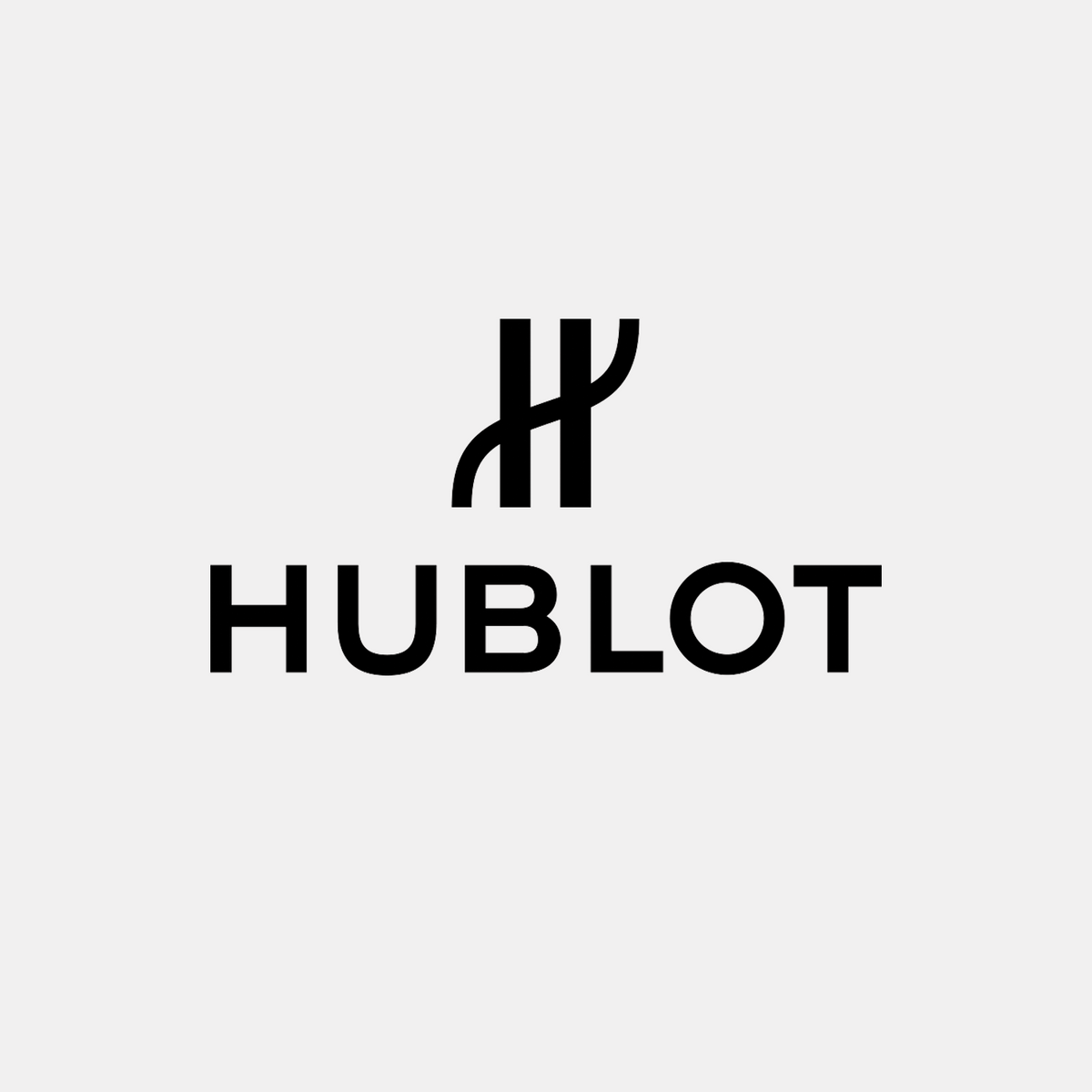 Hublot logo in black on a light gray background.