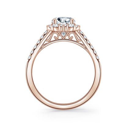 Elegant Emerald Graduated Halo Diamond Engagement Ring