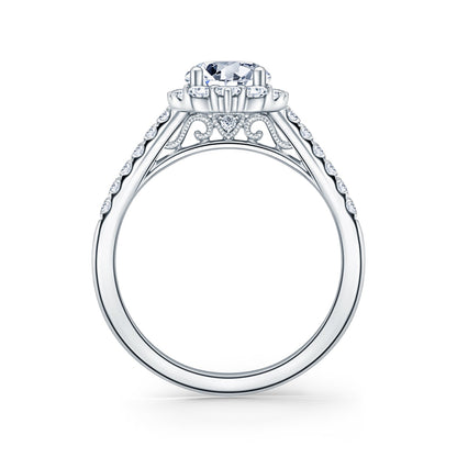Elegant Emerald Graduated Halo Diamond Engagement Ring