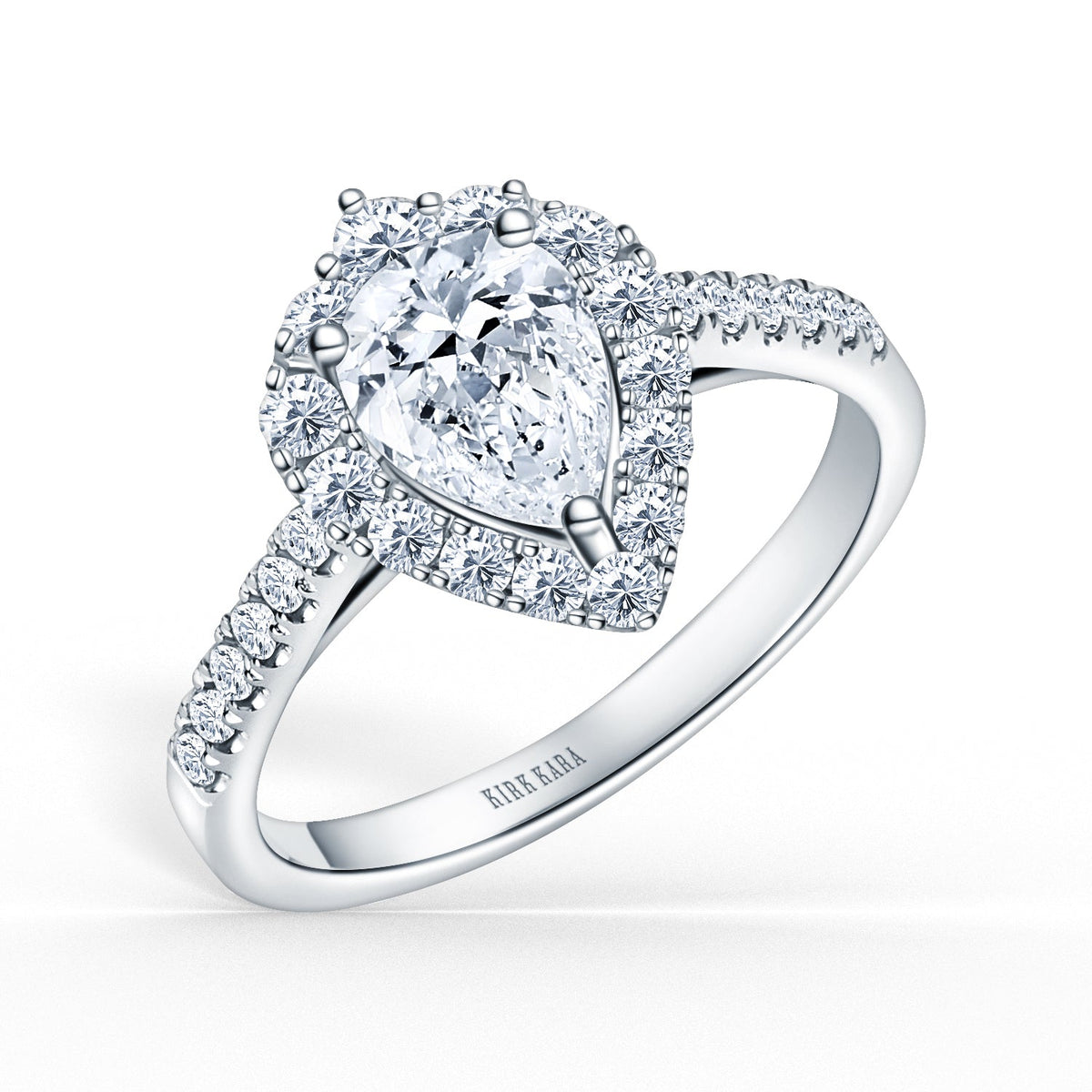 Elegant Pear Graduated Halo Diamond Engagement Ring