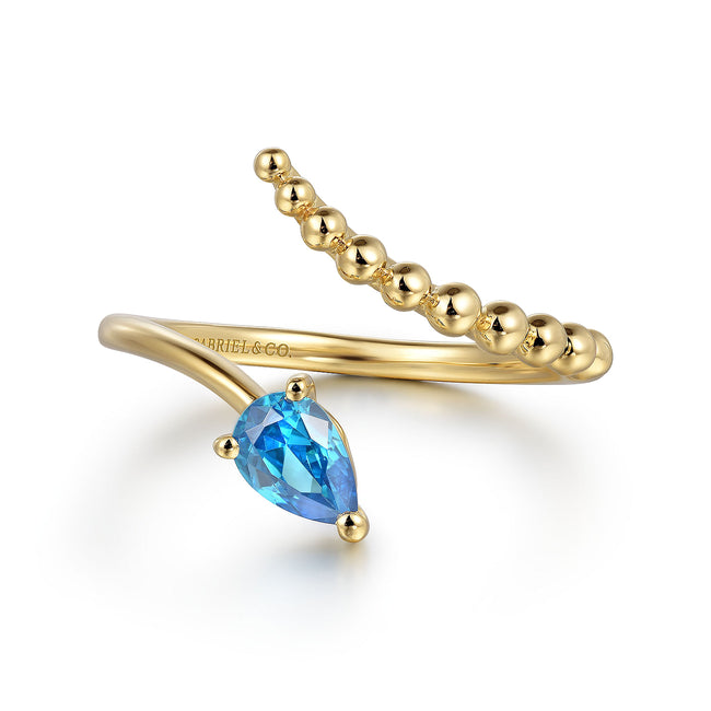 14K Yellow Gold Blue Topaz Bujukan Bypass Ladies Ring