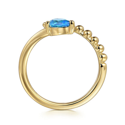 14K Yellow Gold Blue Topaz Bujukan Bypass Ladies Ring