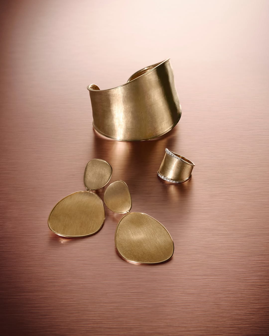 Marco Bicego Lunaria Collection with a ring, bangle, and earrings