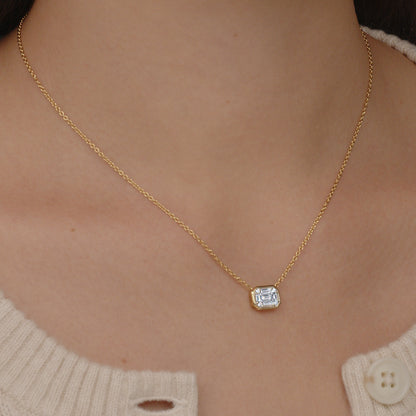 Sunburst Emerald Cut Diamond Bezel Set East-West Pendant in 18K Yellow Gold