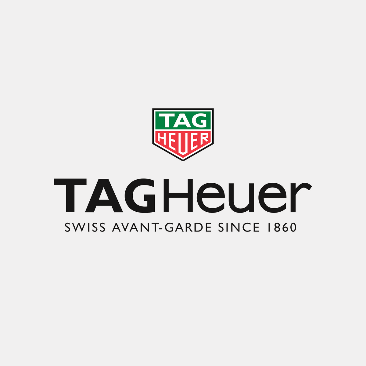 TAG Heuer brand logo and wordmark on a light gray background, with the shield emblem above the text 'TAGHeuer' and 'SWISS AVANT-GARDE SINCE 1860'.