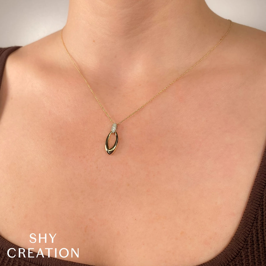 0.05CT 14K2T Y/W DIAMOND OVAL NECKLACE