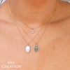 0.16CT 14K Y/G DIAMOND CROSS OVAL NECKLACE