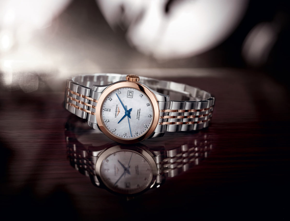 Record 26.00 mm White mother-of-pearl Stainless steel and rose gold 18 carats cap 200 L23205877 L2.320.5.87.7 back view